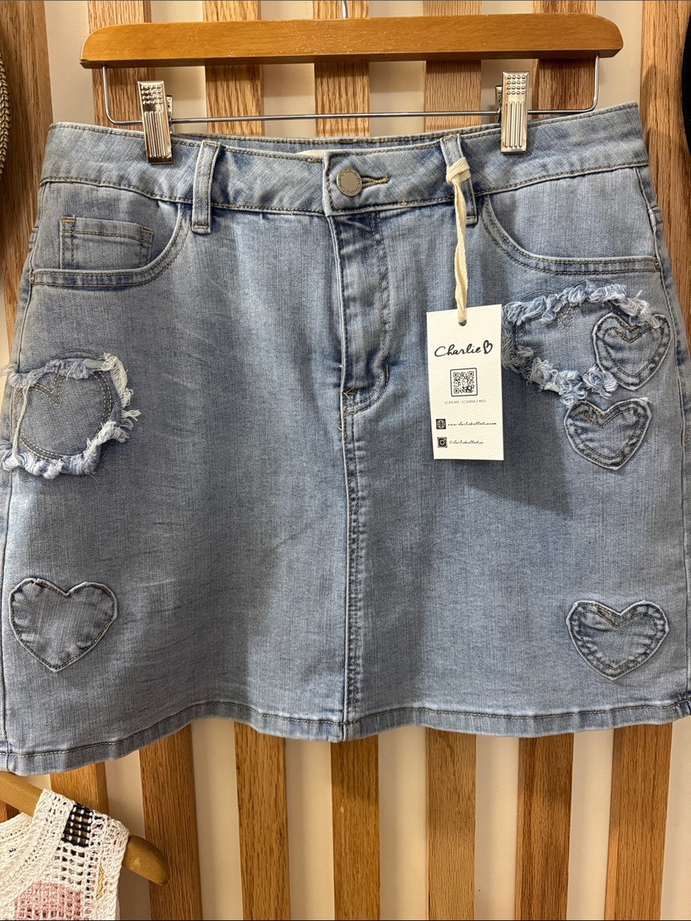 CHARLIE B Light Wash Denim Mini Skirt with Frayed Heart Details